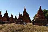 The cluster of red brick temples, named Khay-min-gha on the map on the North plain of Bagan. Myanmar. 